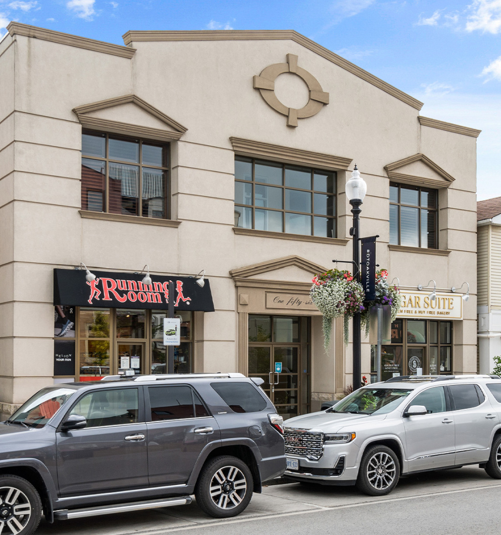 Storefront of Strongman Properties located in Oakville, Ontario.